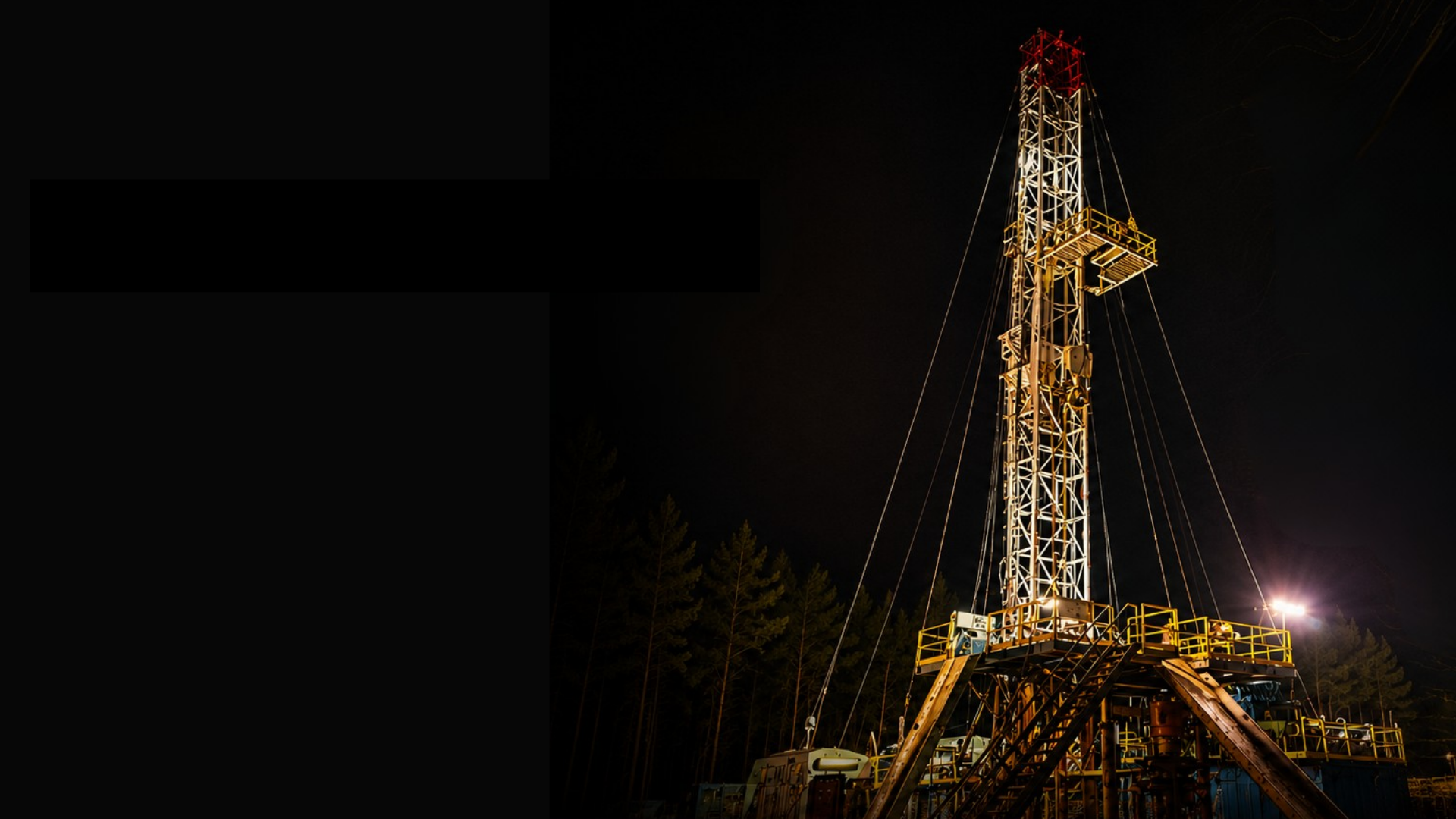 Rise Drilling rig lit up at night on a Texas drilling location